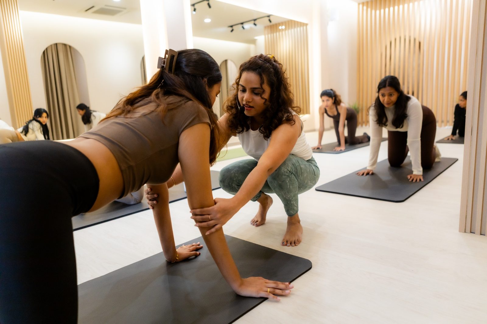A Bonesio physiotherapist guiding a client through a movement session
