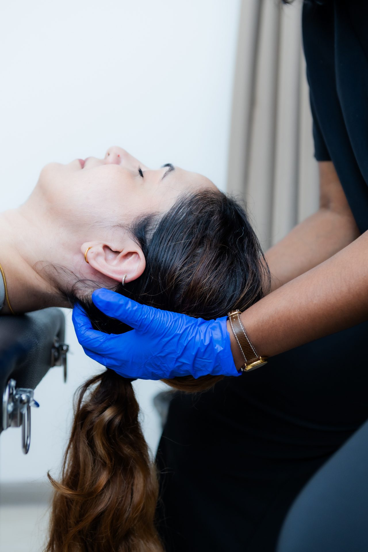 A Bonesio physiotherapist performing hands-on manual therapy on a client
